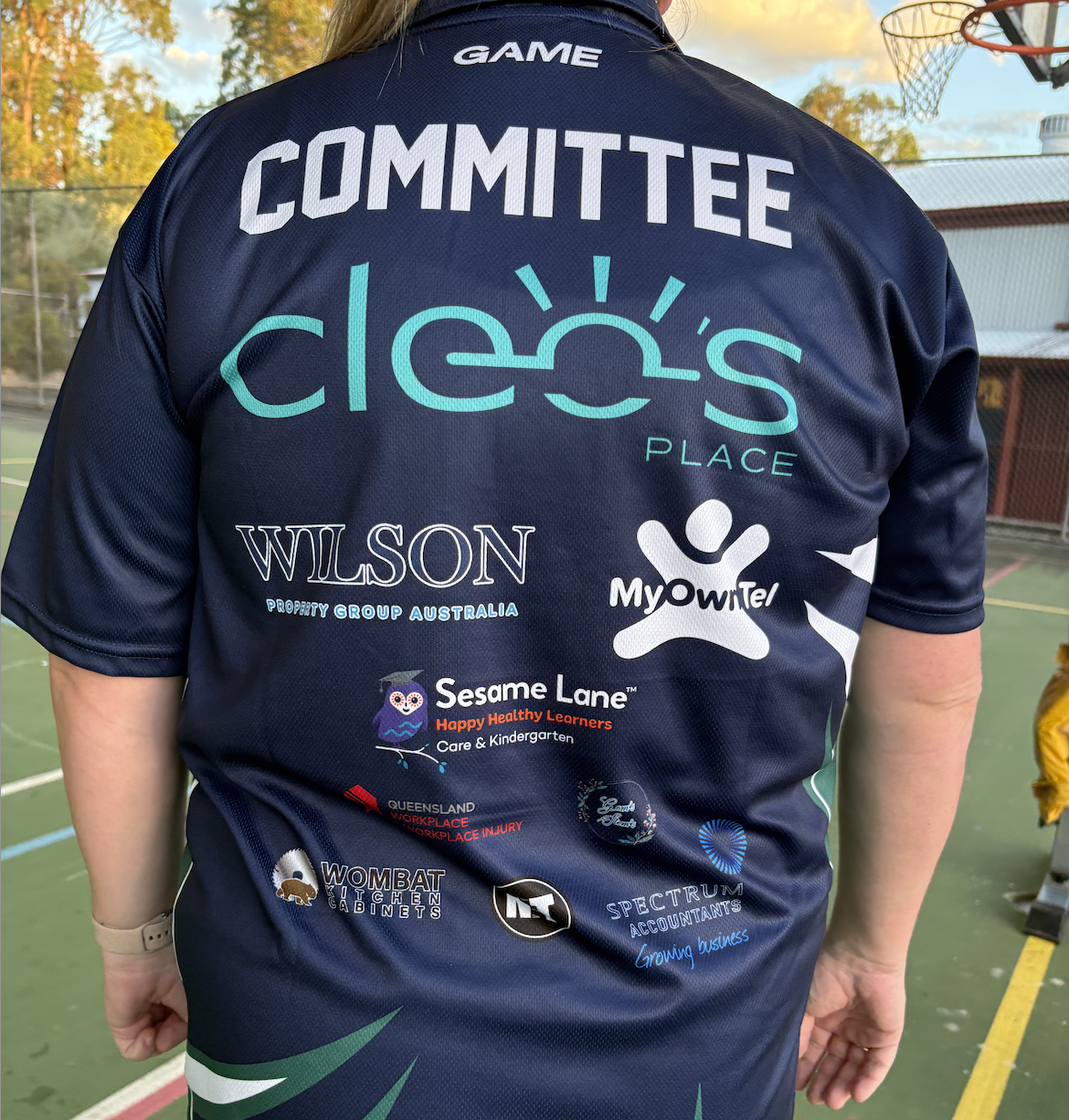 Netball Shirt with Sponsors, Cleo's Place, Honest Plumbing Solutions, Narangba Valley Tavern