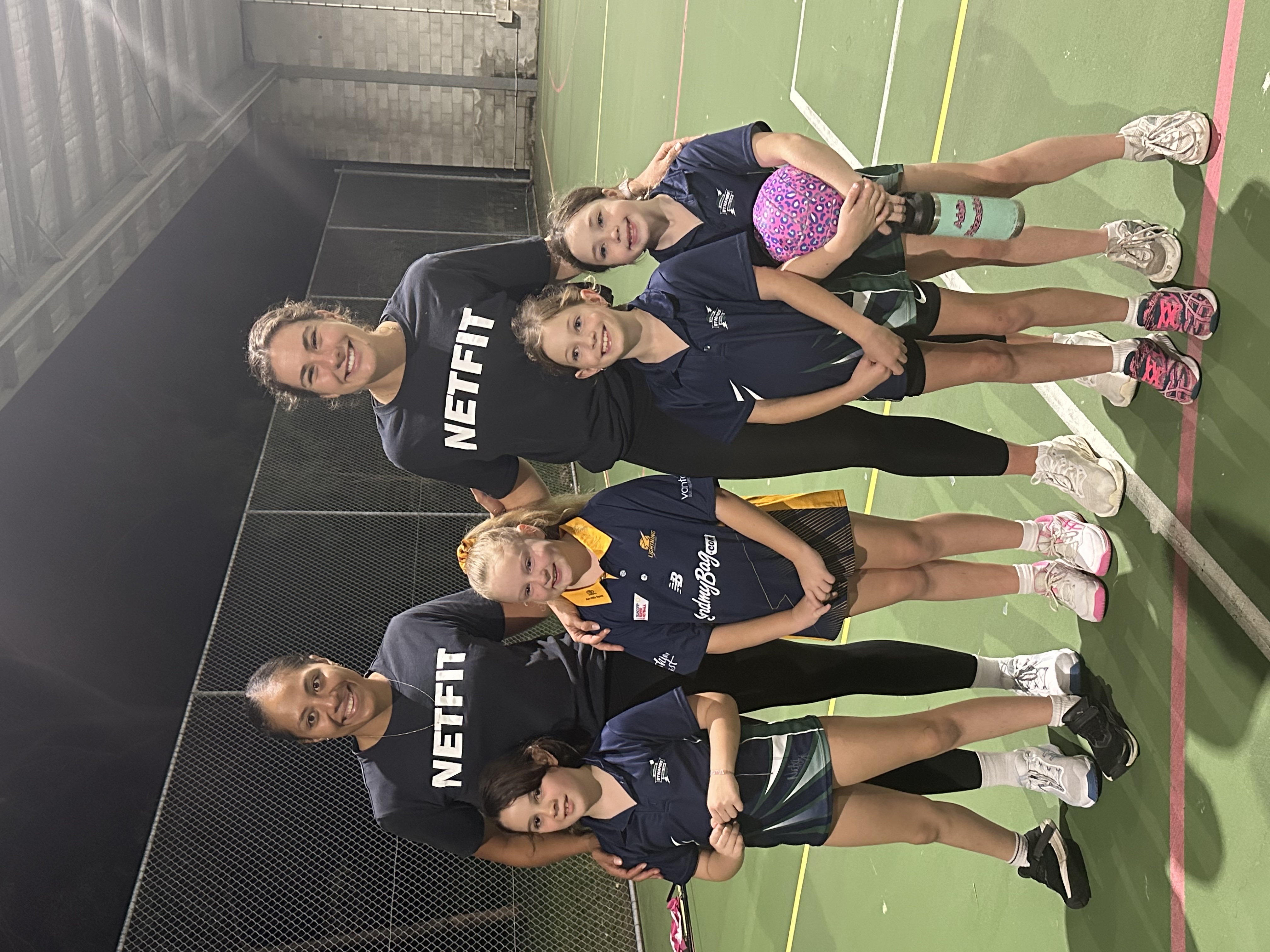 Netball team at netball carnival having fun