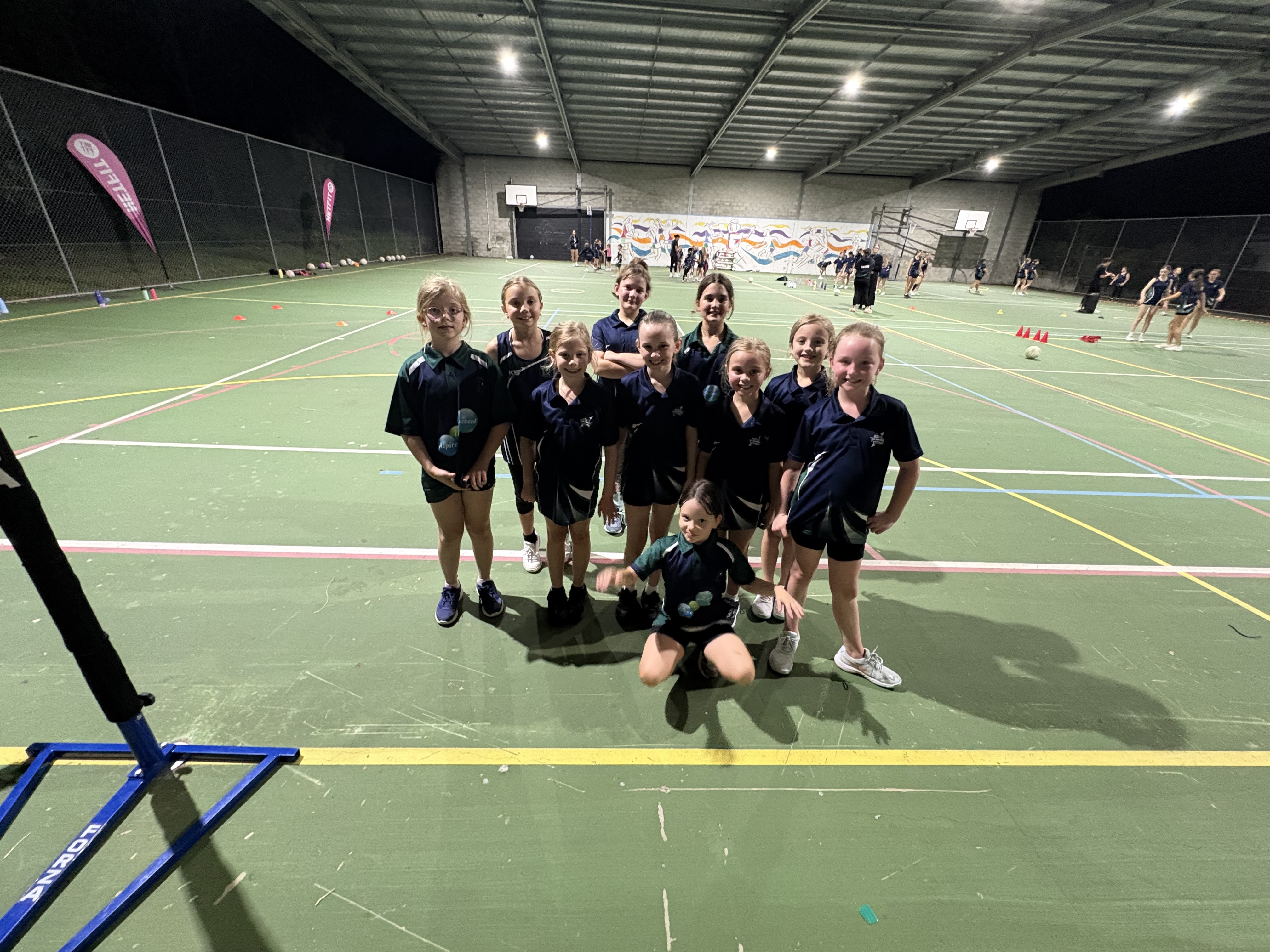Young netball team at carnival day, narangba dynamos netball